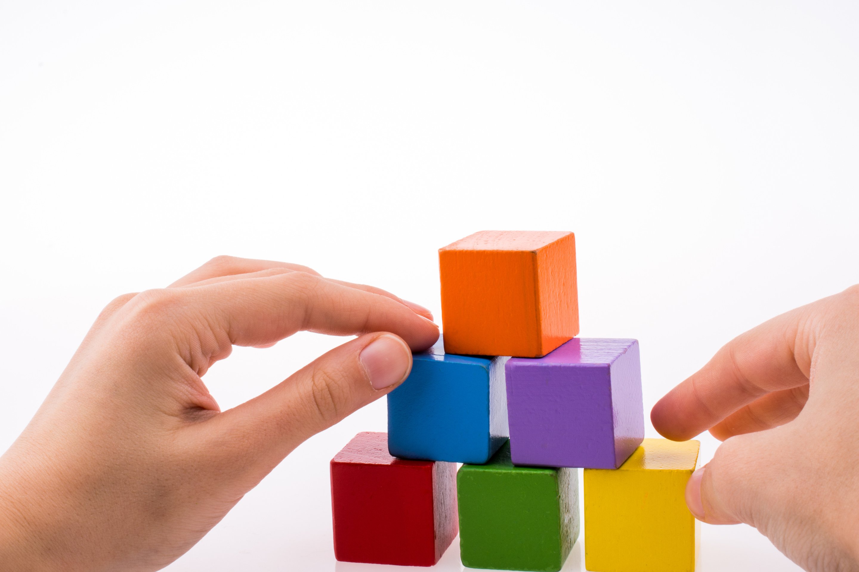 Hand Playing with Cubes